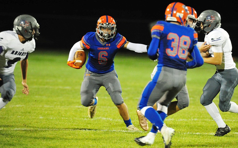 Chino Valley's Elijah Scordato looks for a lane as the Cougars host Arizona College Prep Friday, Sept. 14, 2018. (Les Stukenberg/Courier)