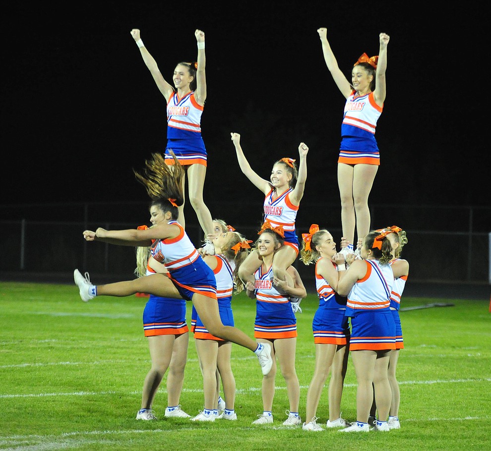 Chino Valley's cheereaders perform at halftime as the Cougars host Arizona College Prep Friday, Sept. 14, 2018. (Les Stukenberg/Courier)