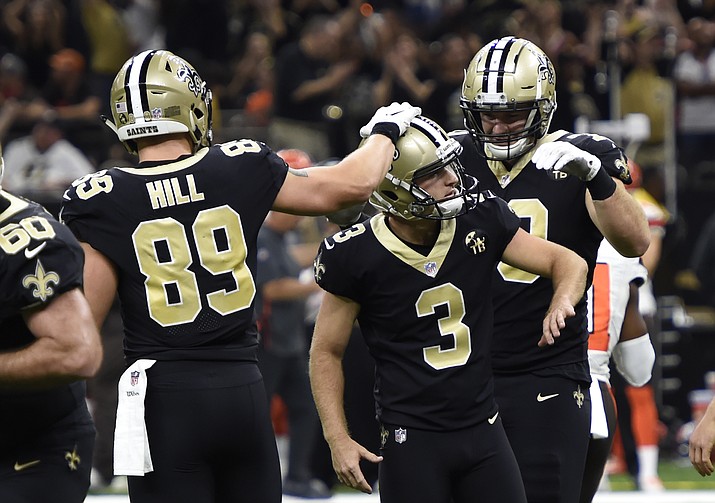  New Orleans Saints kicker Wil Lutz (3) is congratulated by tight end Josh Hill after kicking the game winning field goal during the second half of an NFL football game in New Orleans against the Cleveland Browns, Sunday, Sept. 16, 2018. The Saints won 21-18. (Bill Feig/AP)