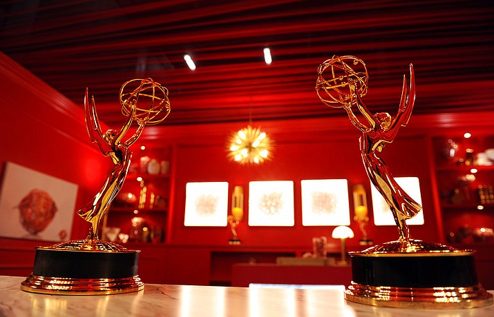 In this Sept. 13, 2018 file photo, Emmy Award statuettes are displayed inside the Lindt Chocolate Lounge inside the Microsoft Theatre in Los Angeles. The 70th Emmy Awards will be held on Monday. (Photo by Chris Pizzello/Invision/AP, File)

