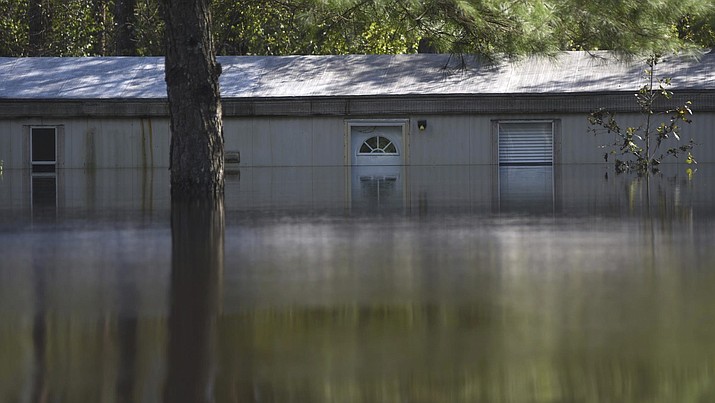 Severe flooding from the Northeast Cape Fear River due to the torrential rains from Hurricane Florence is seen in Burgaw, N.C., Wednesday, Sept. 19, 2018. (Matt Born/The Star-News via AP)