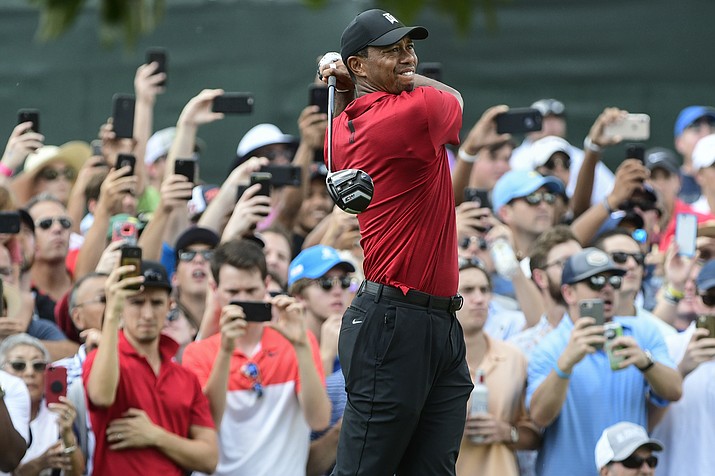 Tiger Woods hits from the third tee during the final round of the Tour Championship golf tournament Sunday, Sept. 23, 2018, in Atlanta. (John Amis/AP)
