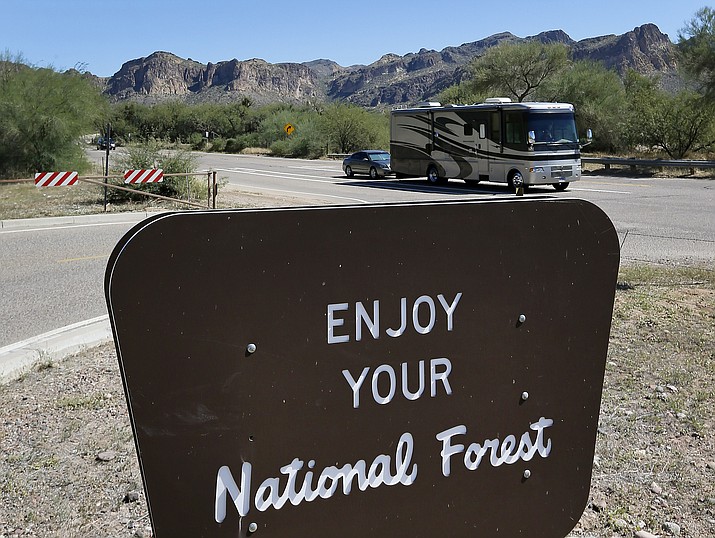 An RV drives through the Tonto National Forest, Tuesday, Oct. 1, 2013 in Mesa, Ariz. (Matt York/AP file)