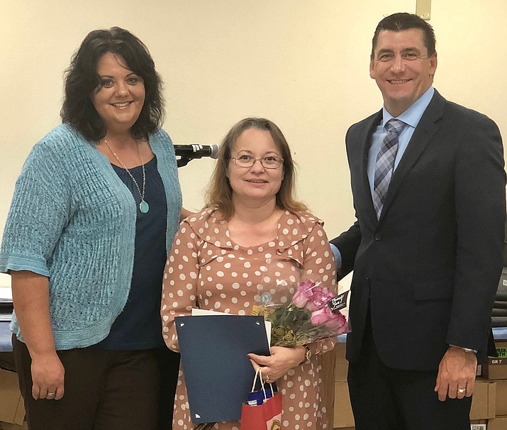 Mrs. RosaMaria Corradi, center, is the Humboldt Unified School District Teacher of the Month for September. With her are Danette Derickson, left, principal of Liberty Traditional, and Dan Streeter, superintendent for the district. (Courtesy)