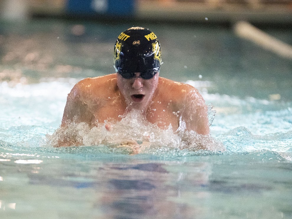 Prescott's Blake Francis swims the breast stroke leg of the medley relay as the Badgers host Wickenburg in swimming Thursday, October 4, 2018 at the Prescott YMCA. (Les Stukenberg/Courier)