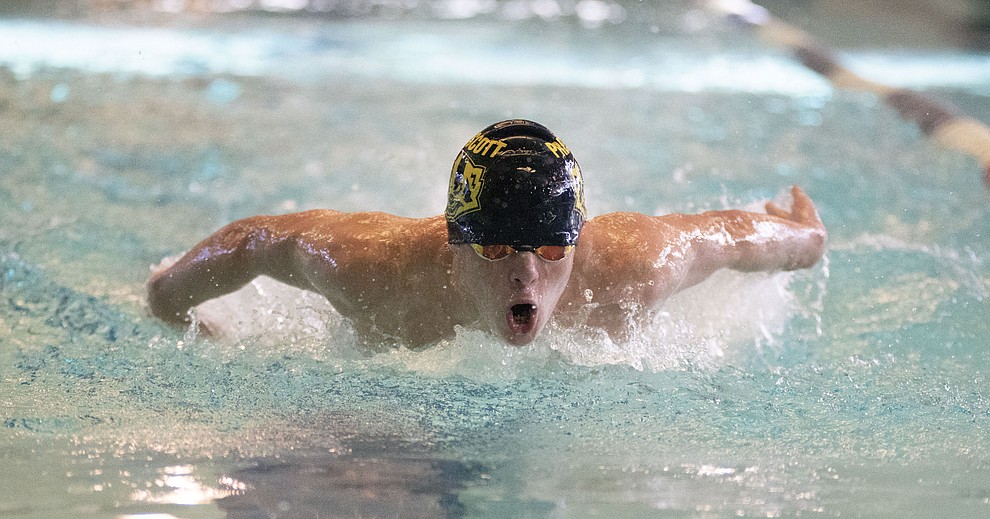 Prescott's Dane Bassett swims the butterfly leg of the medley relay as the Badgers host Wickenburg in swimming Thursday, October 4, 2018 at the Prescott YMCA. (Les Stukenberg/Courier)