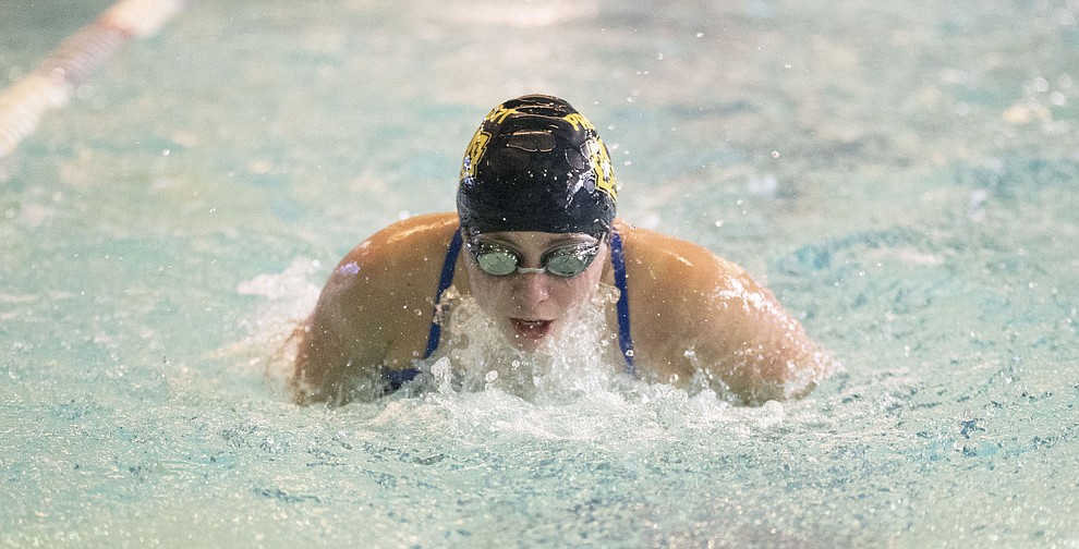 Prescott's Lacey Ingallina swims the butterfly leg of the medley relay as the Badgers host Wickenburg in swimming Thursday, October 4, 2018 at the Prescott YMCA. (Les Stukenberg/Courier)