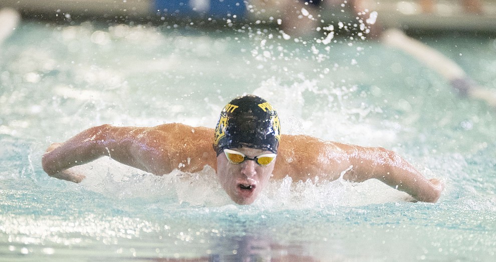 Prescott's Harris Temple swims the butterfly in the individual medley as the Badgers host Wickenburg in swimming Thursday, October 4, 2018 at the Prescott YMCA. (Les Stukenberg/Courier)