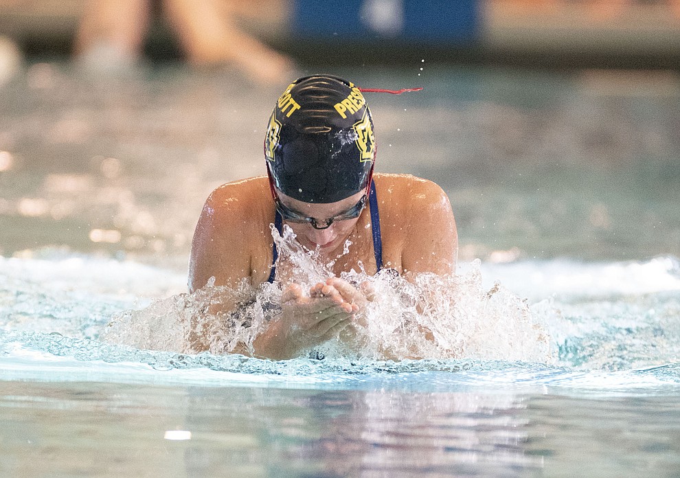 Prescott's Aly Warren swims the breast stroke leg of the medley relay as the Badgers host Wickenburg in swimming Thursday, October 4, 2018 at the Prescott YMCA. (Les Stukenberg/Courier)