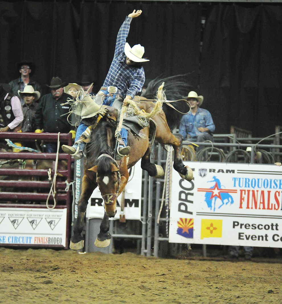 Leon Fountain rides Dakota Babe for a score of 83 and won the saddle bronc title at the Turquoise Circuit Finals Rodeo Saturday, Oct. 6, 2018 at the Prescott Valley Event Center. (Les Stukenberg/Courier)