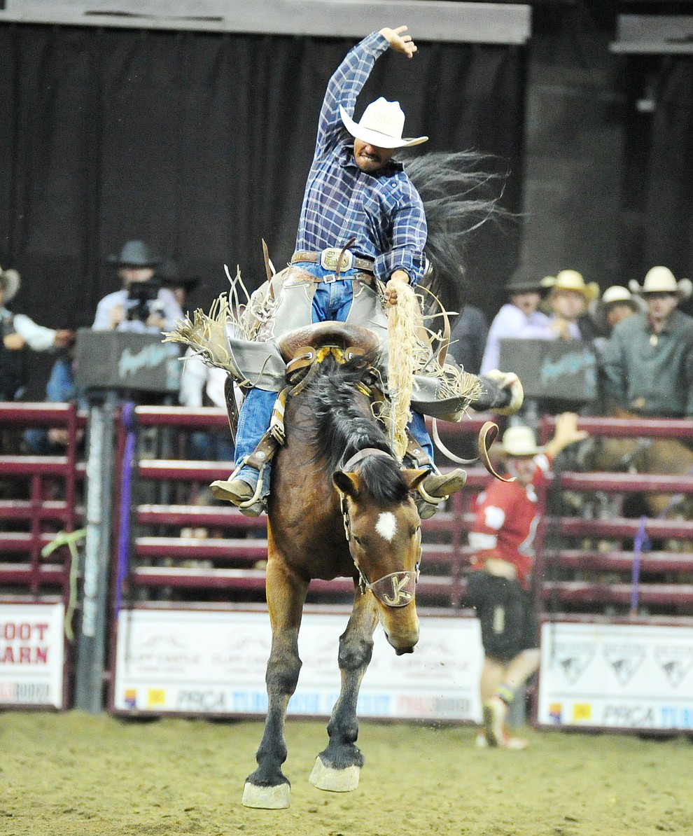 Leon Fountain rides Dakota Babe for a score of 83 and won the saddle bronc title at the Turquoise Circuit Finals Rodeo Saturday, Oct. 6, 2018 at the Prescott Valley Event Center. (Les Stukenberg/Courier)