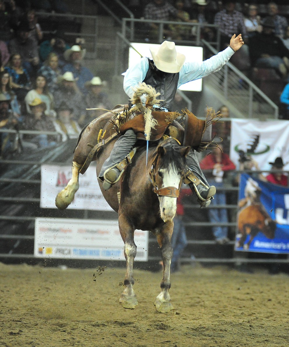 Corey LeFebre scores 78.5 on Smoke Ring in the saddle bronc riding at the Turquoise Circuit Final Rodeo Saturday, Oct. 6, 2018 at the Prescott Valley Event Center. (Les Stukenberg/Courier)