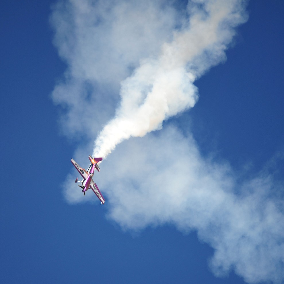 Bill Stein does acrobatic maneuvers in his Edge 540 during the Wings Out West Airshow at Prescott Regional Airport Saturday, Oct. 6, 2018. (Les Stukenberg/Courier)