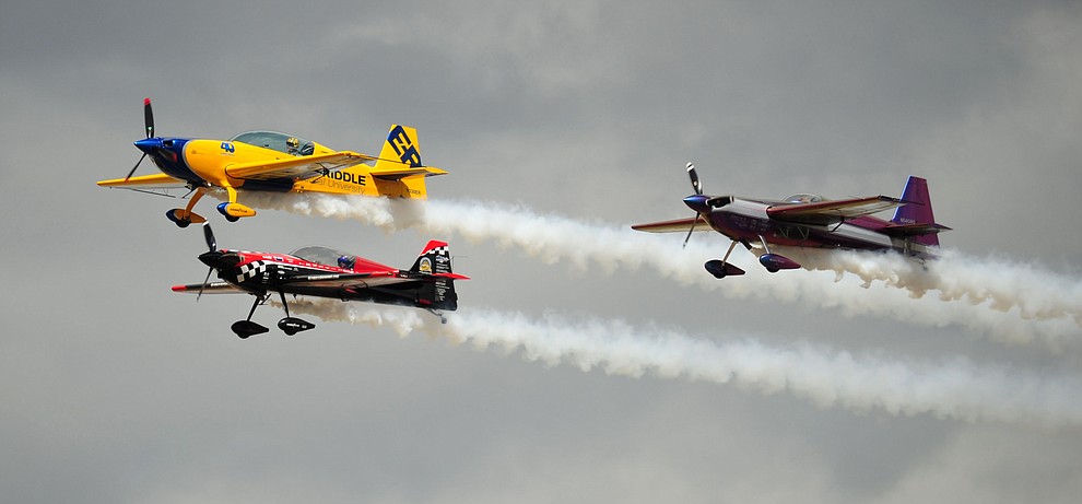 Matt Chapman, Bill Stein and Rob Holland perform aerial acrobatics during the Wings Out West Airshow at Prescott Regional Airport Saturday, Oct. 6, 2018. (Les Stukenberg/Courier)