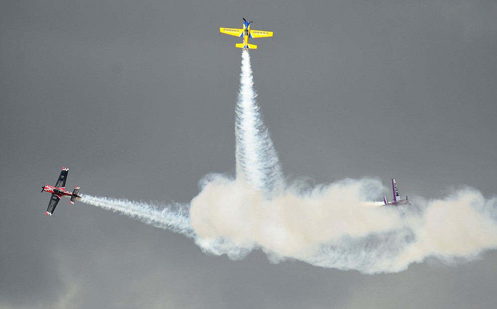 Matt Chapman, Bill Stein and Rob Holland perform aerial acrobatics during the Wings Out West Airshow at Prescott Regional Airport Saturday, Oct. 6, 2018. (Les Stukenberg/Courier)