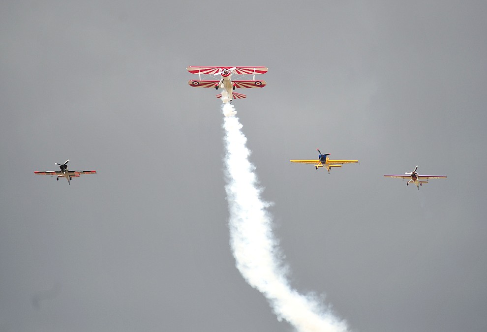 A missing man formation with Gary Rower, Matt Chapman, Bill Stein and Rob Holland during the Wings Out West Airshow at Prescott Regional Airport Saturday, Oct. 6, 2018. (Les Stukenberg/Courier)