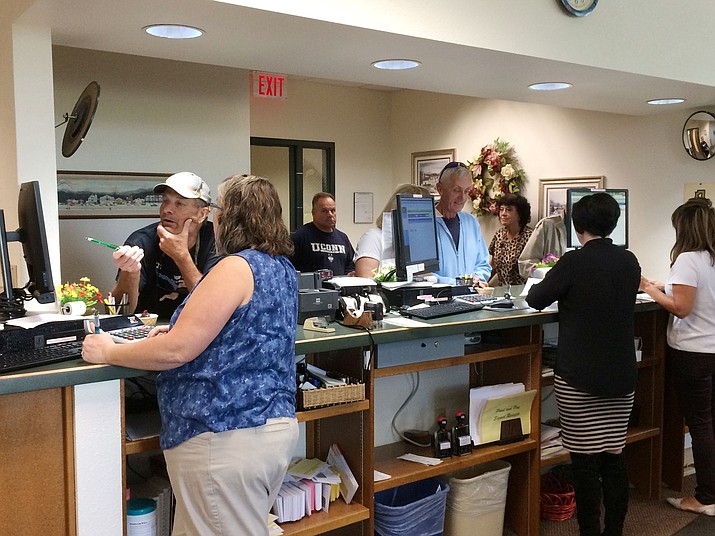 Customers wanting to pay their property tax bills inundate the Yavapai County Treasurer’s Office Wednesday, Oct. 3, after receiving bills Monday that indicated a payment due date of Oct. 1. (Sue Tone/Courier)