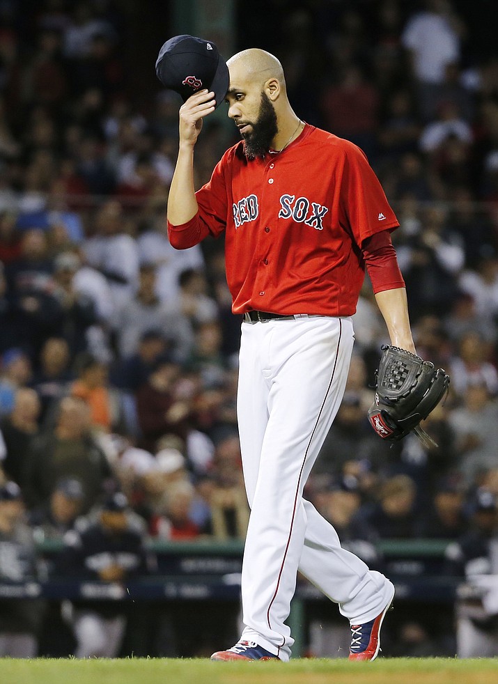 Boston Red Sox starting pitcher David Price is taken out during the second inning of Game 2 of a baseball American League Division Series against the New York Yankees, Saturday, Oct. 6, 2018, in Boston. (Elise Amendola/AP)