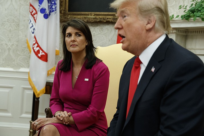 President Donald Trump speaks during a meeting with outgoing U.S. Ambassador to the United Nations Nikki Haley in the Oval Office of the White House, Tuesday, Oct. 9, 2018, in Washington. (Evan Vucci/AP)