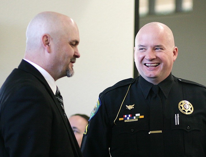Steve McClure, right, and new Marshal Corey Rowley share a laugh Monday in the Camp Verde Magistrate Court. McClure took the oath of office Monday as the Marshal’s Office promoted him from deputy to sergeant. VVN/Bill Helm