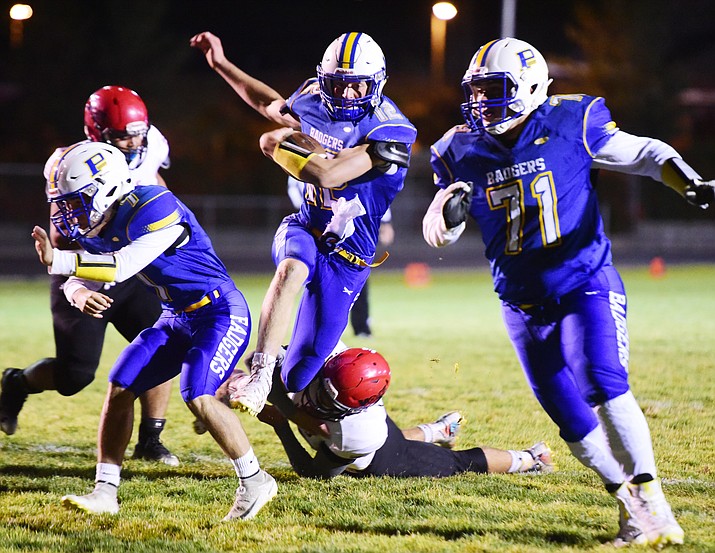 Prescott's Austin Clark runs for another big gain and touchdown as the Badgers take on Lee Williams Friday, Oct. 19, 2018 in Prescott. (Les Stukenberg/Courier)