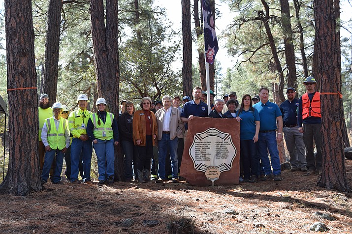 Bob Betts, former chair of Prescott Area Wildfire Urban Interface Commission (PAWUIC), left center, and Prescott City Council Member Billie Orr feature in the new video “Project Andrew,” which premiered at the Oct. 4 PAWUIC meeting. (Reinhold Toft/Courtesy)