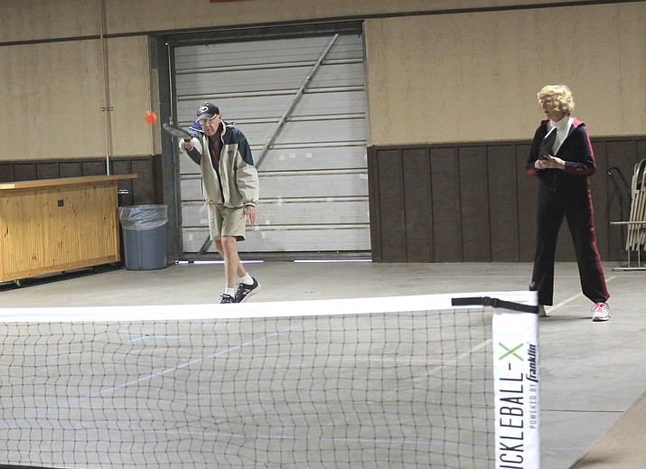 Sue and Jack Hadley team up during a pickleball competition.