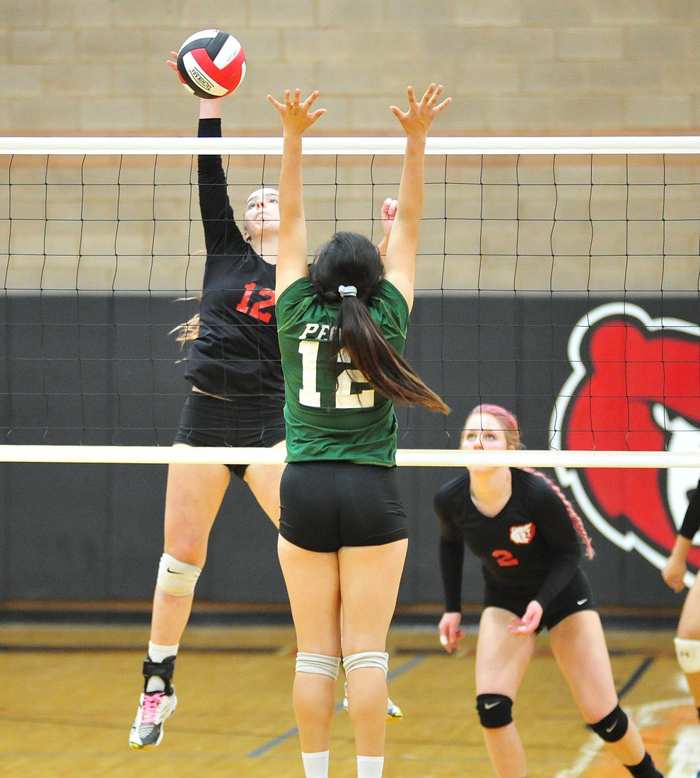 Bradshaw Mountain's Jordyn Moser sends down a kill as the Bears play in the play-in game for the AIA 4A State Volleyball Tournament against Peoria Thursday, Oct. 25, 2018 in Prescott Valley. (Les Stukenberg/Courier).