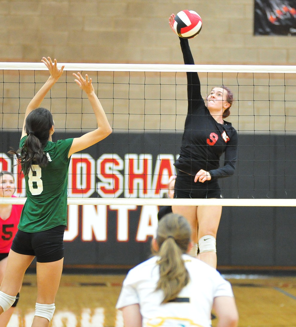 Bradshaw Mountain's Peyton Bradshaw sends a kill through the middle as the Bears play in the play-in game for the AIA 4A State Volleyball Tournament against Peoria Thursday, Oct. 25, 2018 in Prescott Valley. (Les Stukenberg/Courier).