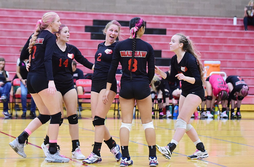 Bradshaw Mountain players reacts after taking a 2-1 lead inthe match as the Bears play in the play-in game for the AIA 4A State Volleyball Tournament against Peoria Thursday, Oct. 25, 2018 in Prescott Valley. (Les Stukenberg/Courier).