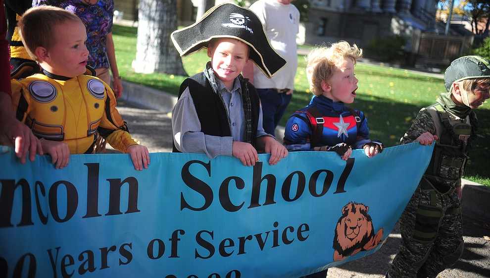 Students from Lincoln Elementary School in Prescott hold their annual Halloween parade around the Courthouse Plaza in Prescott Wednesday, Oct. 31, 2018.  (Les Stukenberg/Courier).