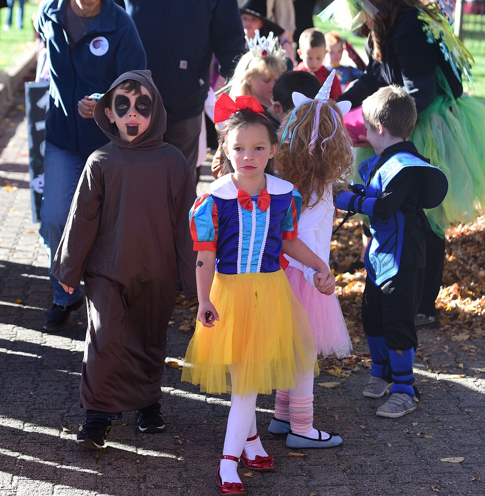 Students from Lincoln Elementary School in Prescott hold their annual Halloween parade around the Courthouse Plaza in Prescott Wednesday, Oct. 31, 2018.  (Les Stukenberg/Courier).