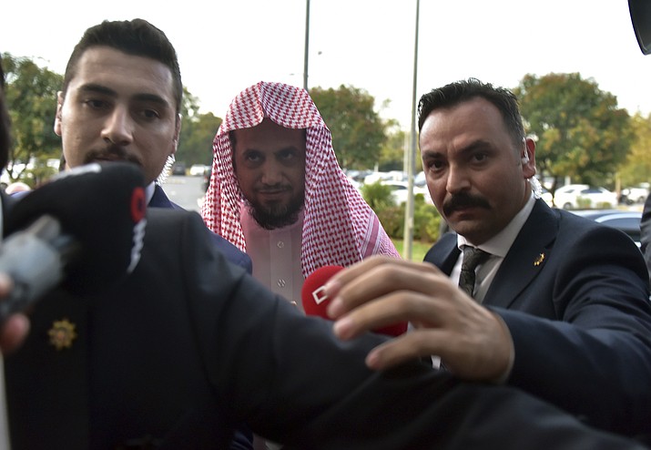 Saudi Arabia's top prosecutor Saud al-Mojeb walks to board a plane to leave Turkey, in Istanbul, Wednesday, Oct, 31, 2018. A top Turkish prosecutor said Wednesday that Saudi journalist Jamal Khashoggi was strangled as soon as he entered the Saudi Consulate in Istanbul as part of a premeditated killing, and that his body was dismembered before being disposed of.(DHA via AP)