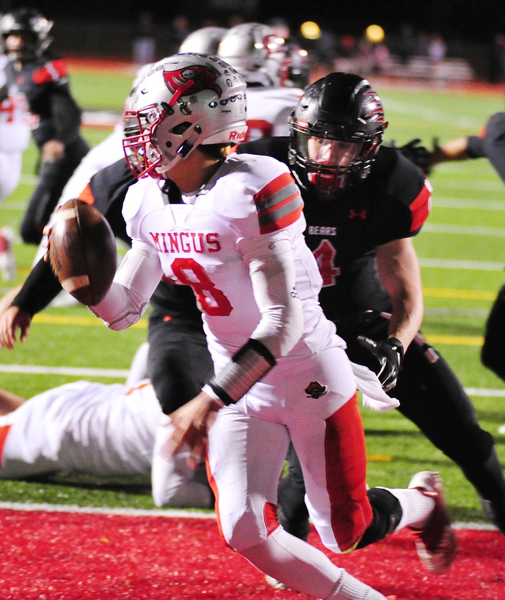 Bradshaw Mountain's Elijah Knisely chases Antoine Zabala as the Bears take on the Mingus Marauders in the first round of the AIA 4A State Football Championship Friday, Nov. 2, 2018 in Prescott Valley. (Les Stukenberg/Courier).