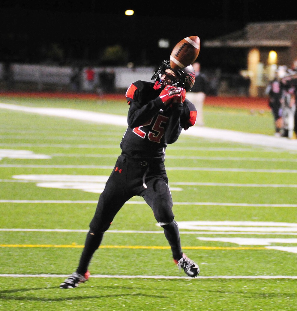 Bradshaw Mountain's Alex Cabral has a pass go through his hands as the Bears take on the Mingus Marauders in the first round of the AIA 4A State Football Championship Friday, Nov. 2, 2018 in Prescott Valley. (Les Stukenberg/Courier).