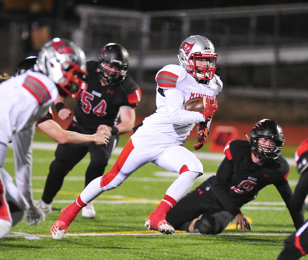 Mingus' Nick Bloniarz runs for yards as the Marauders take on Bradshaw Mountain in the first round of the AIA 4A State Football Championship Friday, Nov. 2, 2018 in Prescott Valley. (Les Stukenberg/Courier).