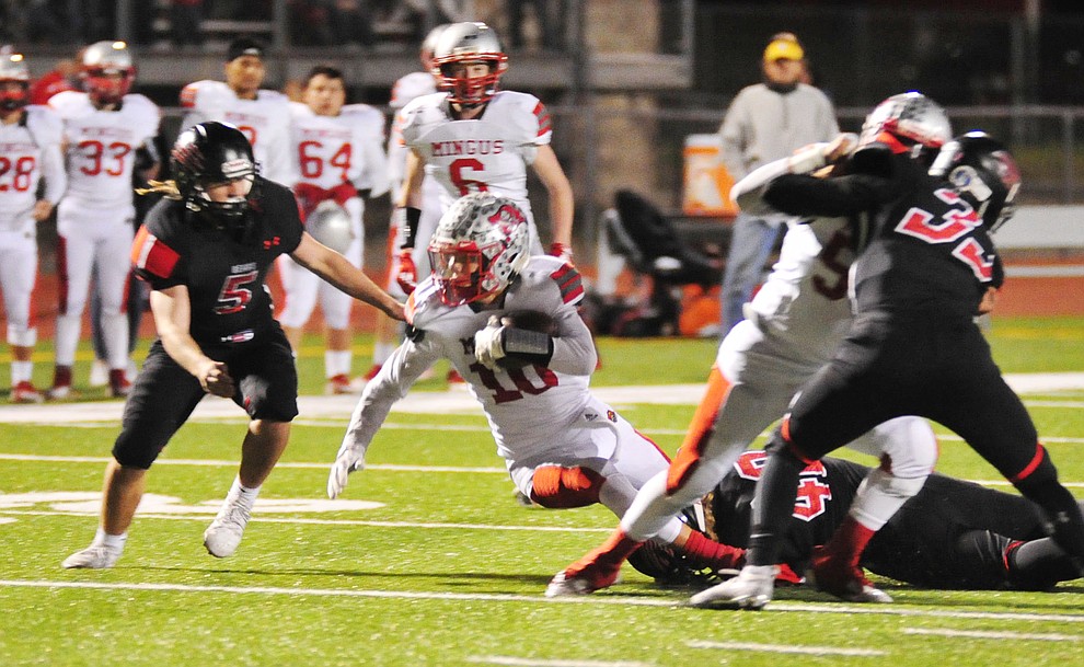 Mingus' Alex Nelson battles for yards as the Marauders take on Bradshaw Mountain in the first round of the AIA 4A State Football Championship Friday, Nov. 2, 2018 in Prescott Valley. (Les Stukenberg/Courier).