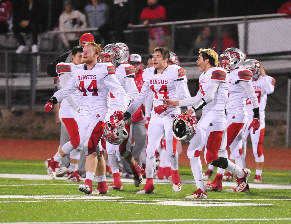 Mingus players celebrate as the Marauders beat Bradshaw Mountain in the first round of the AIA 4A State Football Championship Friday, Nov. 2, 2018 in Prescott Valley. (Les Stukenberg/Courier).