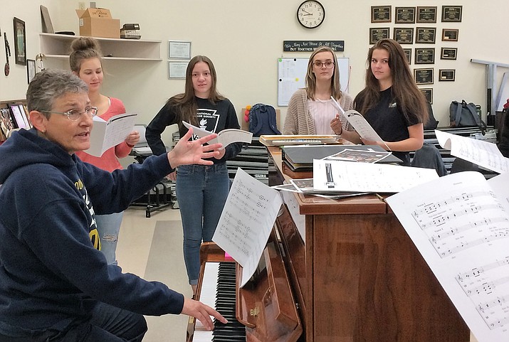 Bradshaw Mountain High School barbershop singers rehearse under the direction of Amy Van Winkle on Oct. 31 for the upcoming Best of Barbershop concert that takes place at 2 p.m. Nov. 10, at Prescott Mile High Middle School. From left are Emma Steverson, Alexandria Semien, Morgan Engelby and Victoria Martin. (Sue Tone/Tribune)