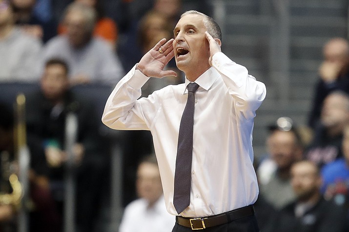 In this March 14, 2018, file photo, Arizona State coach Bobby Hurley shouts to his players during the first half of an NCAA college basketball tournament First Four game in Dayton, Ohio. Arizona State began their season against Cal State Fullerton on Nov. 6 in a 102-94 double overtime win. (John Minchillo/AP, file)