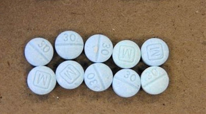 Many of the tablets seized in the Yavapai County area containing fentanyl look like these tablets provided by the Yavapai County Sheriff’s Office and the Partners Against Narcotics Trafficking. (YCSO/Courtesy)