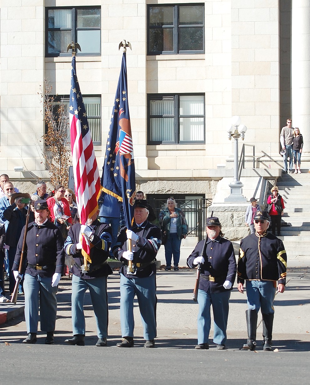 The Prescott Regulators' Arizona Territorial Troopers posted the colors to begin the 2018 Veterans Day Parade in downtown Prescott on Saturday, Nov. 10. (Tim Wiederaenders/Courier)