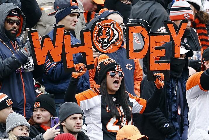Cincinnati Bengals fans cheer in the stands during the first half of a 2017 NFL football game against the Chicago Bears in Cincinnati. Here comes Who Dey vs. Who Dat. Say what? The Who Dat folks from New Orleans go head-on with the Who Dey fans in Cincinnati on Sunday. And don’t ask which group first came up with its catchy phrase and odd rendering of the English language. (Frank Victores/AP, File)