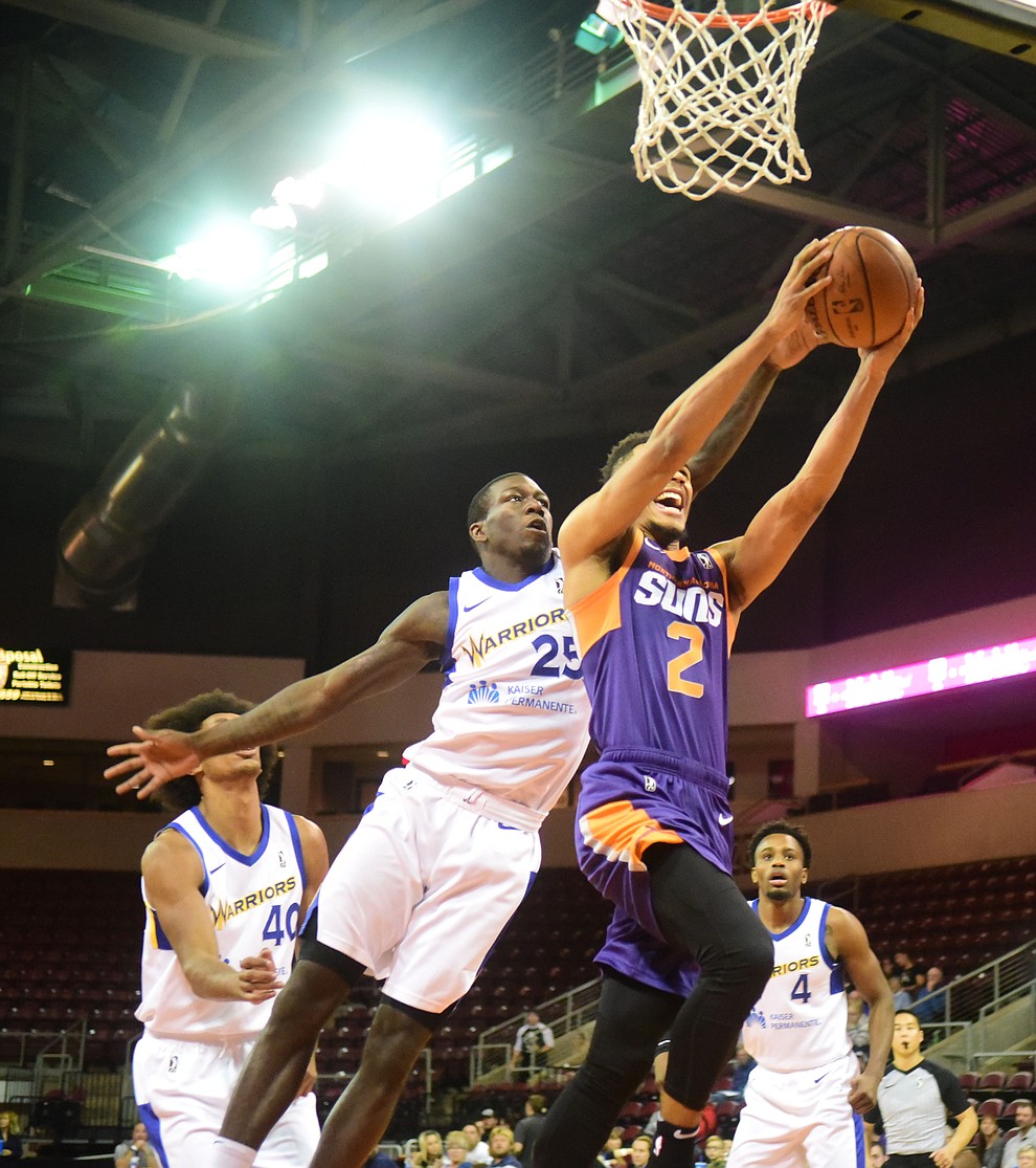 Northern Arizona's Elie Okobo goes tom the basket as the Suns play the Santa Cruz Warriors Tuesday, Nov. 13, 2018 at the Prescott Valley Event Center. (Les Stukenberg/Courier).