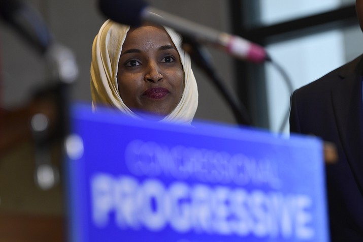 Rep.-elect Ilhan Omar, D-Minn., listens during a news conference with members of the Progressive Caucus in Washington, Monday, Nov. 12, 2018. (Susan Walsh/AP)