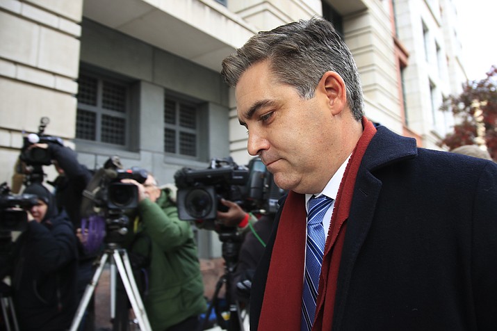 In this Nov. 14, 2018, photo, CNN's Jim Acosta walks into federal court in Washington, to attend a hearing on a legal challenge against President Donald Trump's administration. A judge is expected to announce Friday whether he will order the Trump administration to return the White House press credentials of CNN reporter Jim Acosta. (AP Photo/Manuel Balce Ceneta)