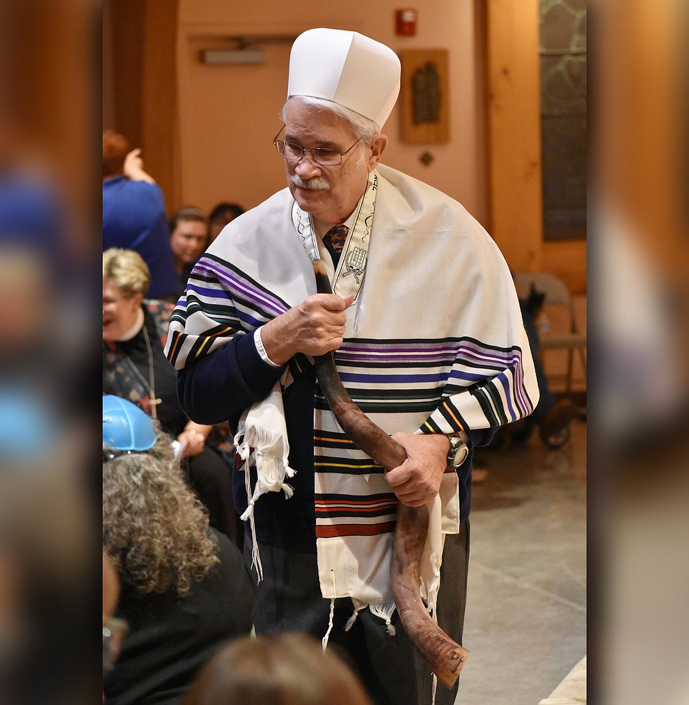 A member of Prescott’s Temple B'rith Shalom holds a Shofar during the interfaith Celebration of Thanks concert on Nov. 15, 2018 at St. Luke’s Episcopal Church in Prescott. The annual event, called "Many Voices of Thanks," brings together choirs, musicians, dancers and speakers from many faith beliefs and is sponsored by the Quad City Interfaith Council. (Richard Haddad/WNI)