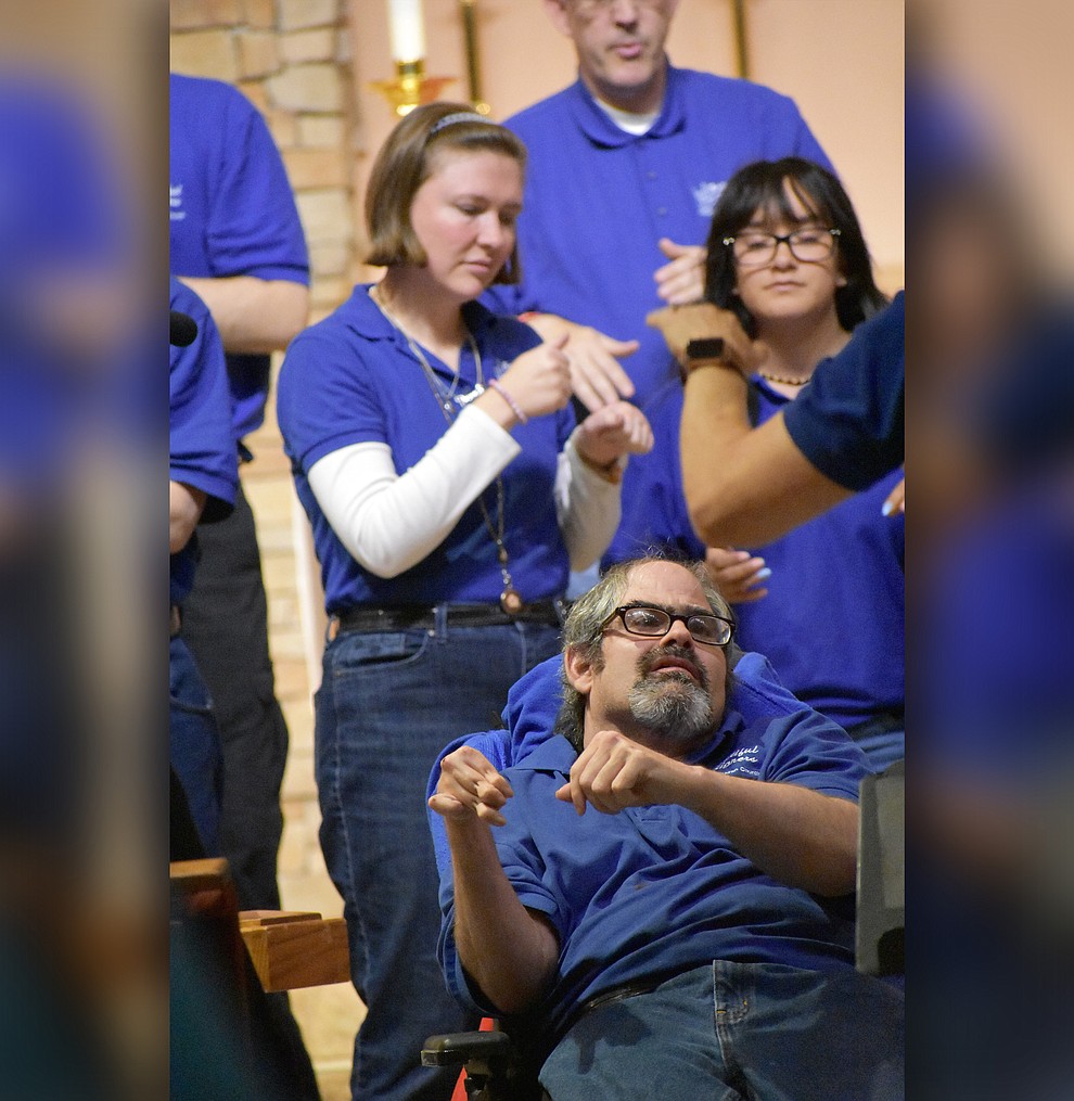 The "Beautiful Singers" sign language choir from American Lutheran Church perform during the 2018 Celebration of Thanks concert held Thursday, Nov. 15 at St. Luke's Episcopal Church in Prescott. The annual event, called "Many Voices of Thanks," brings together choirs, musicians, dancers and speakers from many faith beliefs and is sponsored by the Quad City Interfaith Council. (Richard Haddad/WNI)