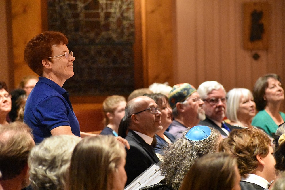 Choir Director Kathy Lilley directs the "Beautiful Singers" sign language choir from American Lutheran Church perform during the 2018 Celebration of Thanks concert held Thursday, Nov. 15 at St. Luke's Episcopal Church in Prescott. The annual event, called "Many Voices of Thanks," brings together choirs, musicians, dancers and speakers from many faith beliefs and is sponsored by the Quad City Interfaith Council. (Richard Haddad/WNI)