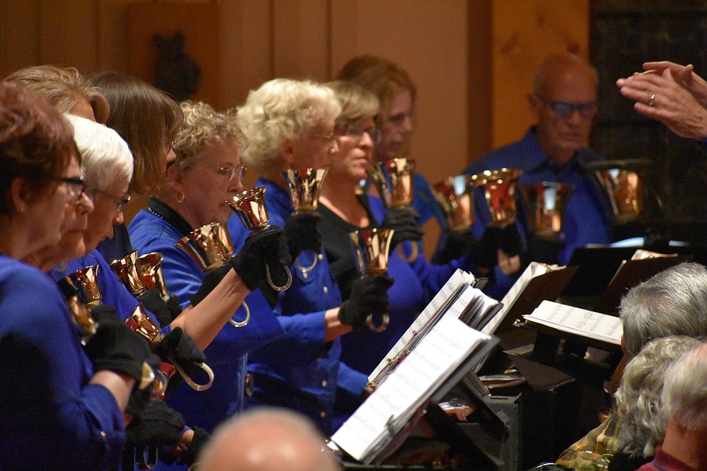 The St. Luke's Episcopal Church Bell Choir performs during the 2018 Celebration of Thanks concert held Thursday, Nov. 15 at St. Luke's Episcopal Church in Prescott. The annual event, called "Many Voices of Thanks," brings together choirs, musicians, dancers and speakers from many faith beliefs and is sponsored by the Quad City Interfaith Council. (Richard Haddad/WNI)